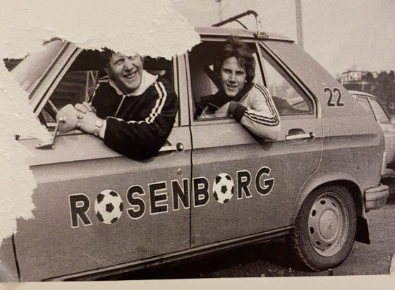 A car with soccer fans